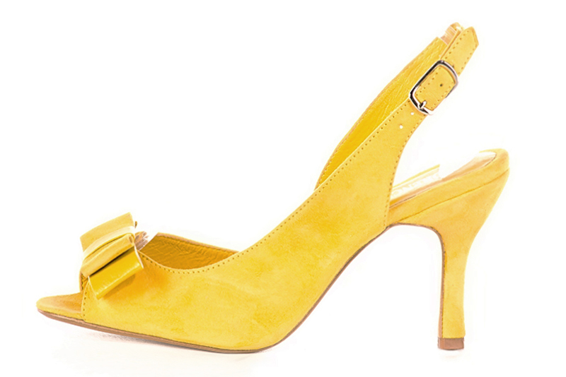 Yellow women's slingback sandals. Round toe. High spool heels. Profile view - Florence KOOIJMAN